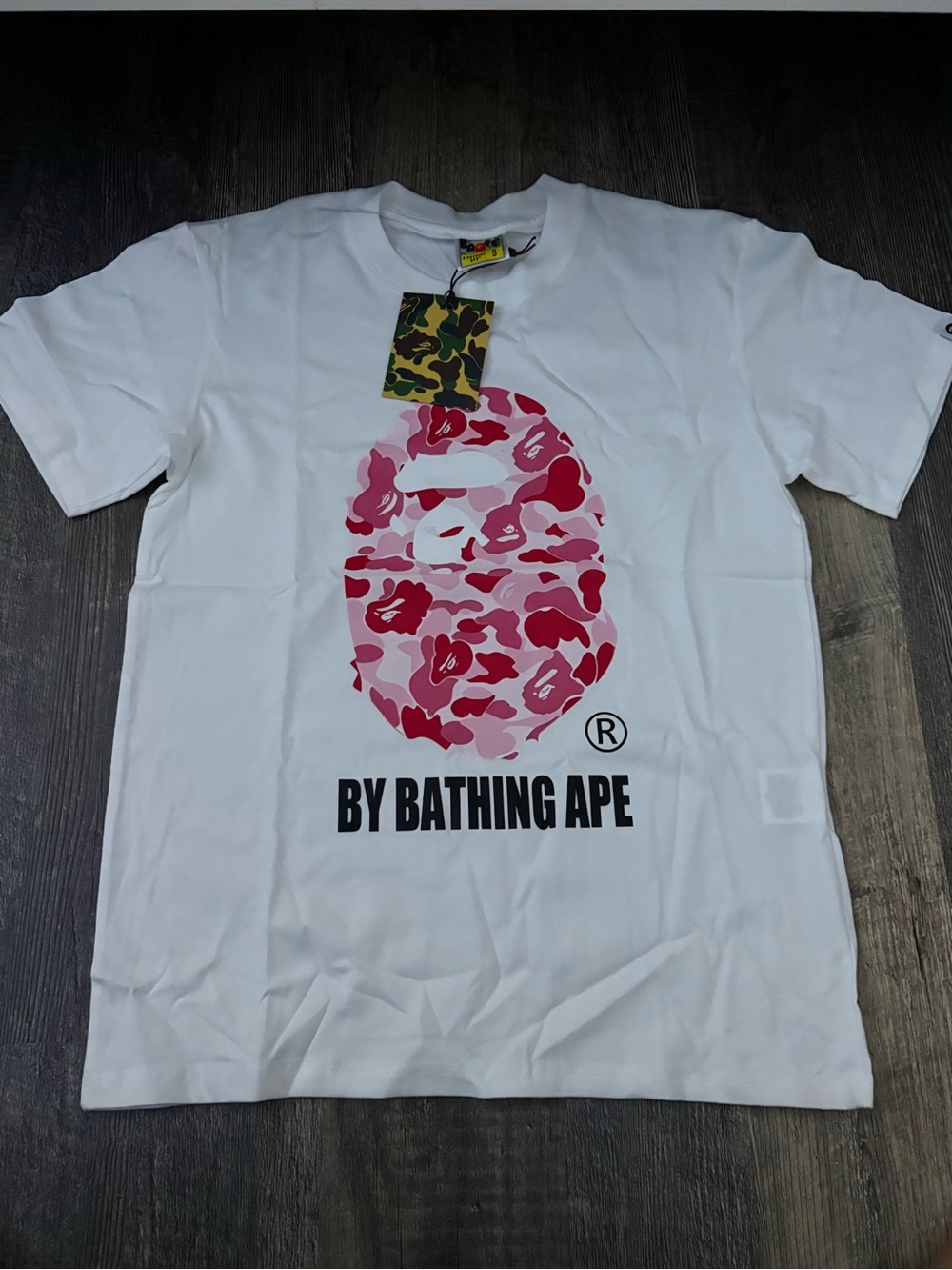 By BapeWhite Tee with Pink Camo Ape Head Graphic